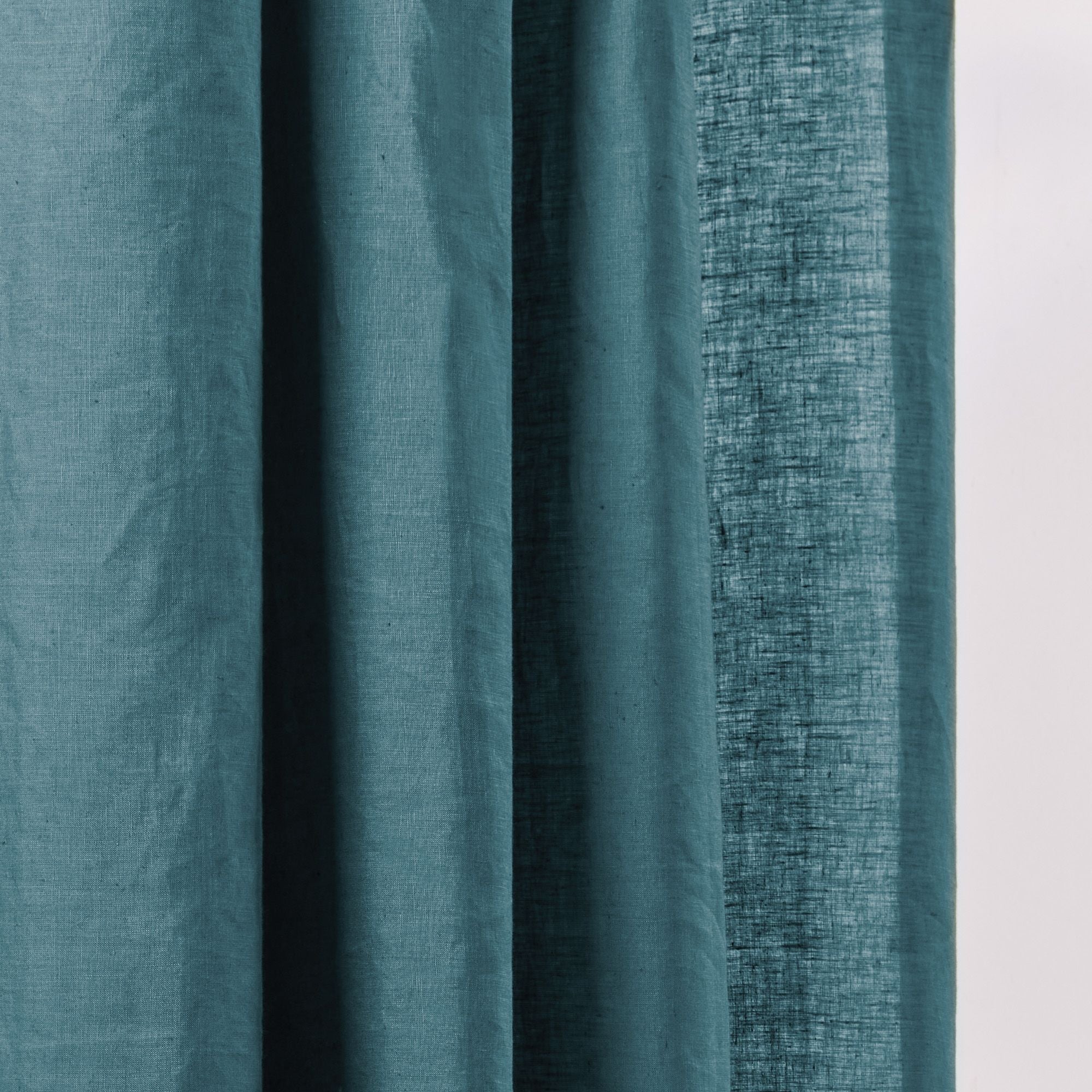 Rideau à oeillets noirs CARLINA pétrole et bourdon noir