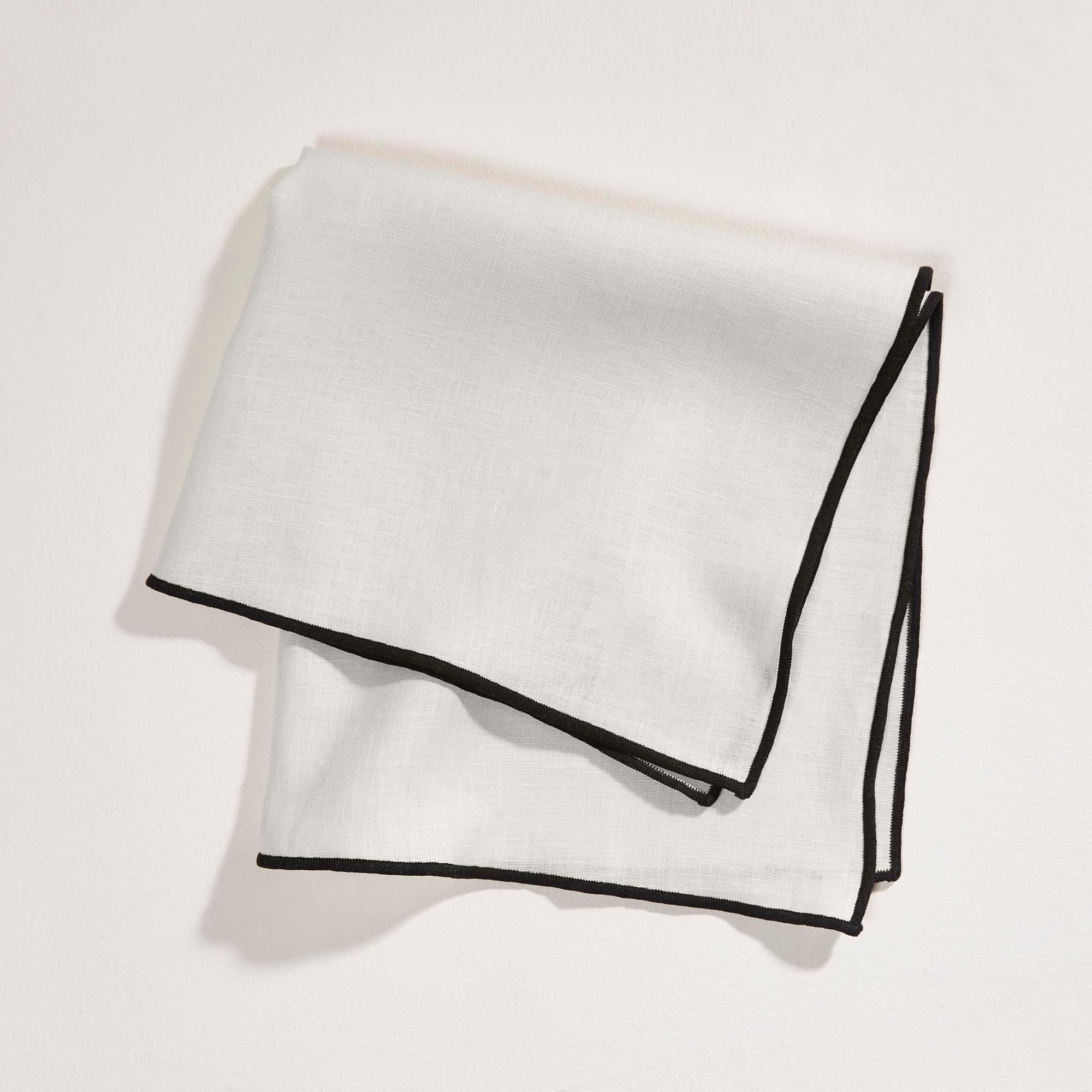 Serviette de table CARLINA calcaire et bourdon noir