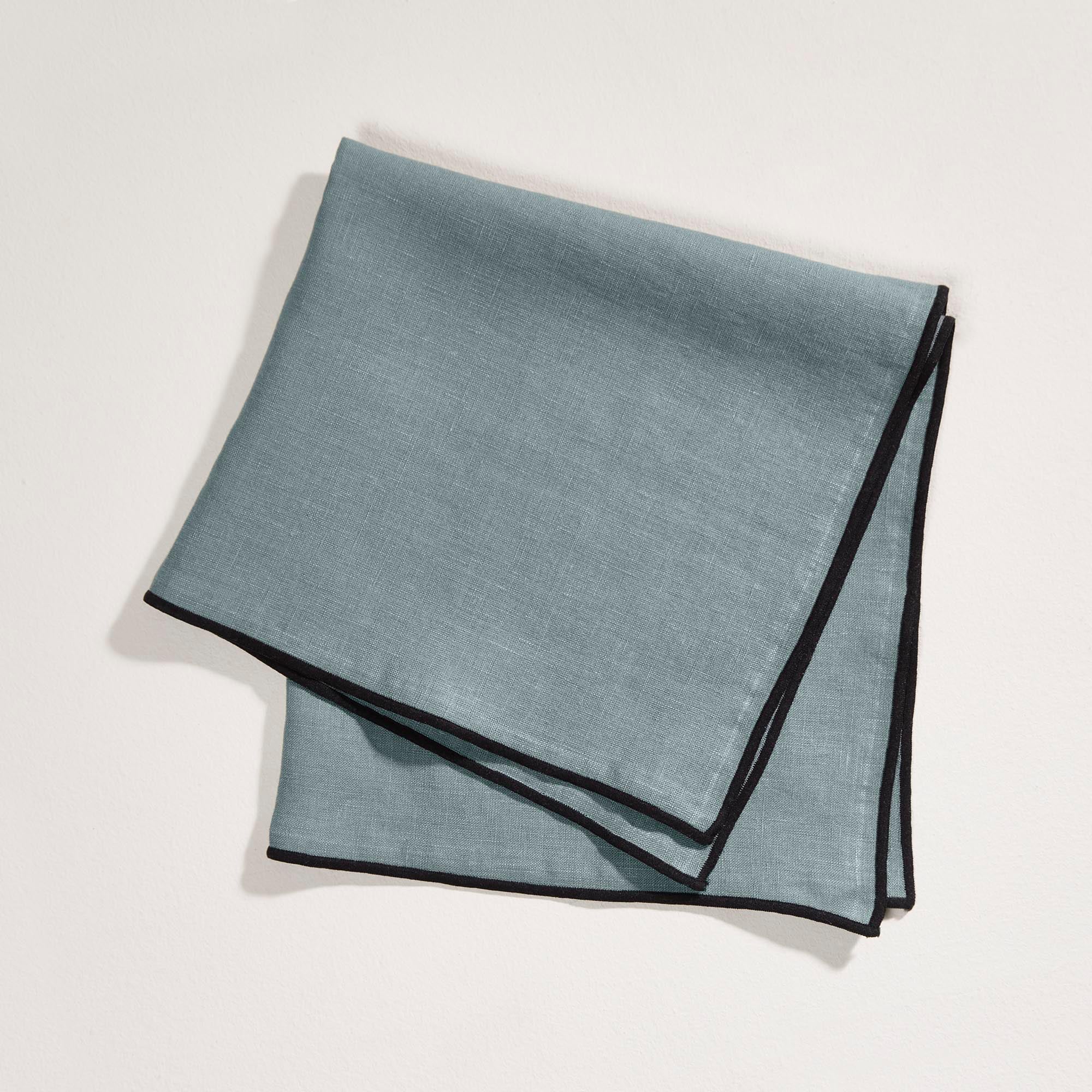Serviette de table CARLINA vert de gris et bourdon noir