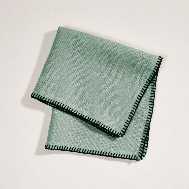 Serviette de table NINO vert de gris et feston noir